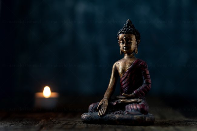 statue buddha candle meditation mstic mindfulness marcelo leonard
