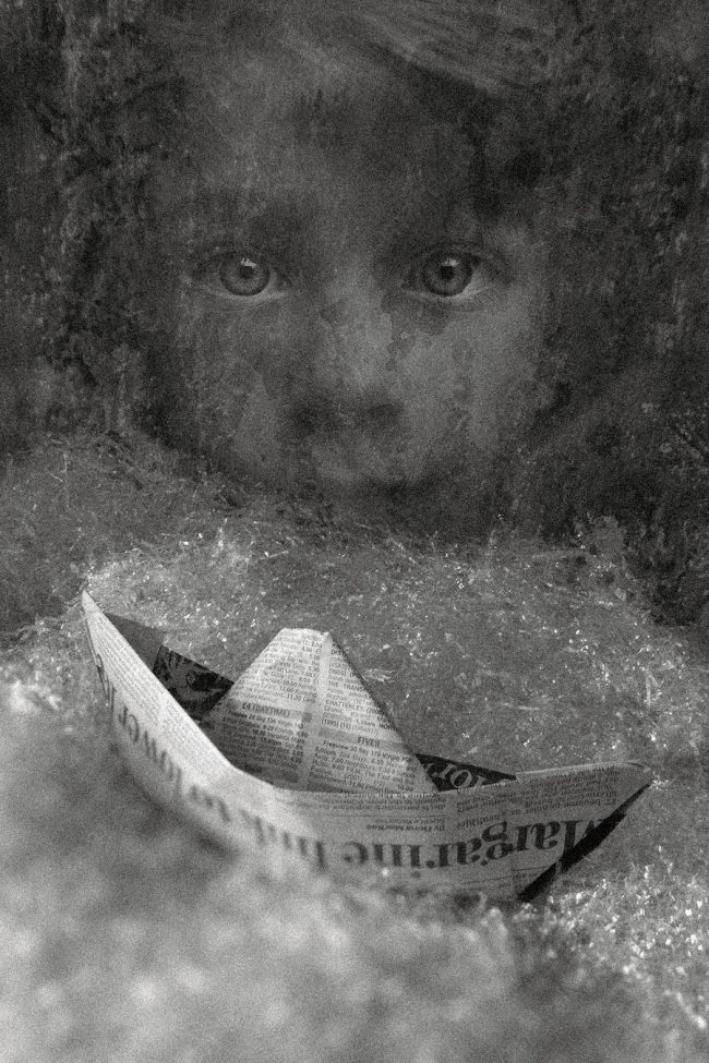 17 child boy eyes paper boat decay broken conceptual photograph marcelo leonard