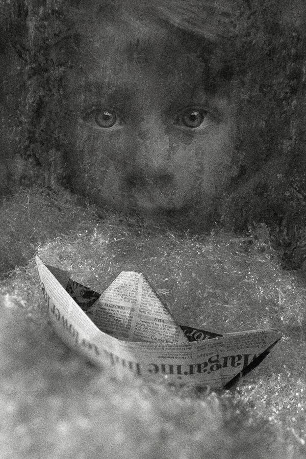 05 c child boy eyes paper boat decay broken conceptual photograph marcelo leonard